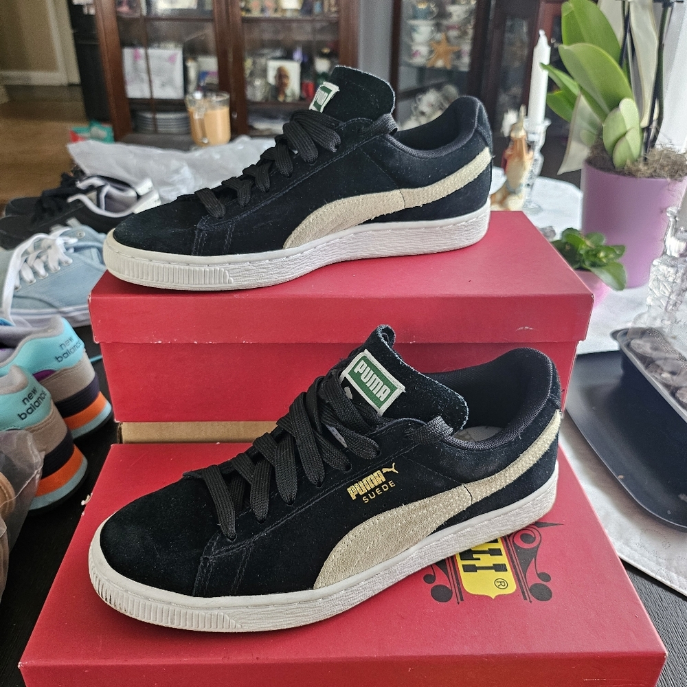 Puma Black and Gold Sneakers